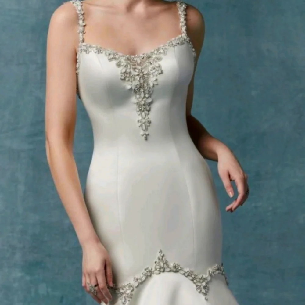 New Maggie Sottero Wedding Dress being stored at bridal store until sold - Picture 3 of 4